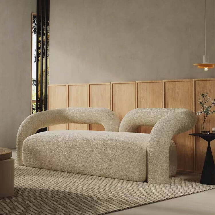 Modern curved sofa upholstered in boucle sherpa fabric with white, gray, yellow, pink, and Tiffany blue colors