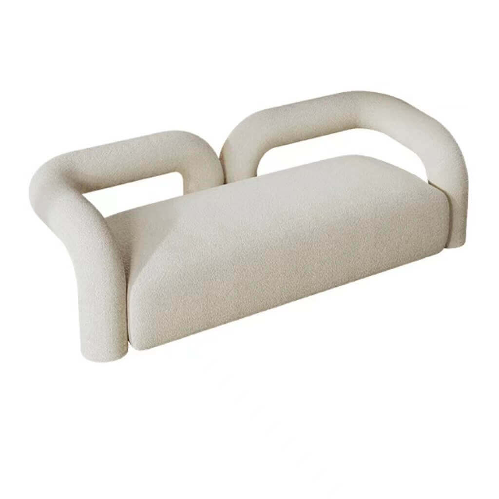 Modern curved sofa upholstered in boucle sherpa fabric with white, gray, yellow, pink, and Tiffany blue colors