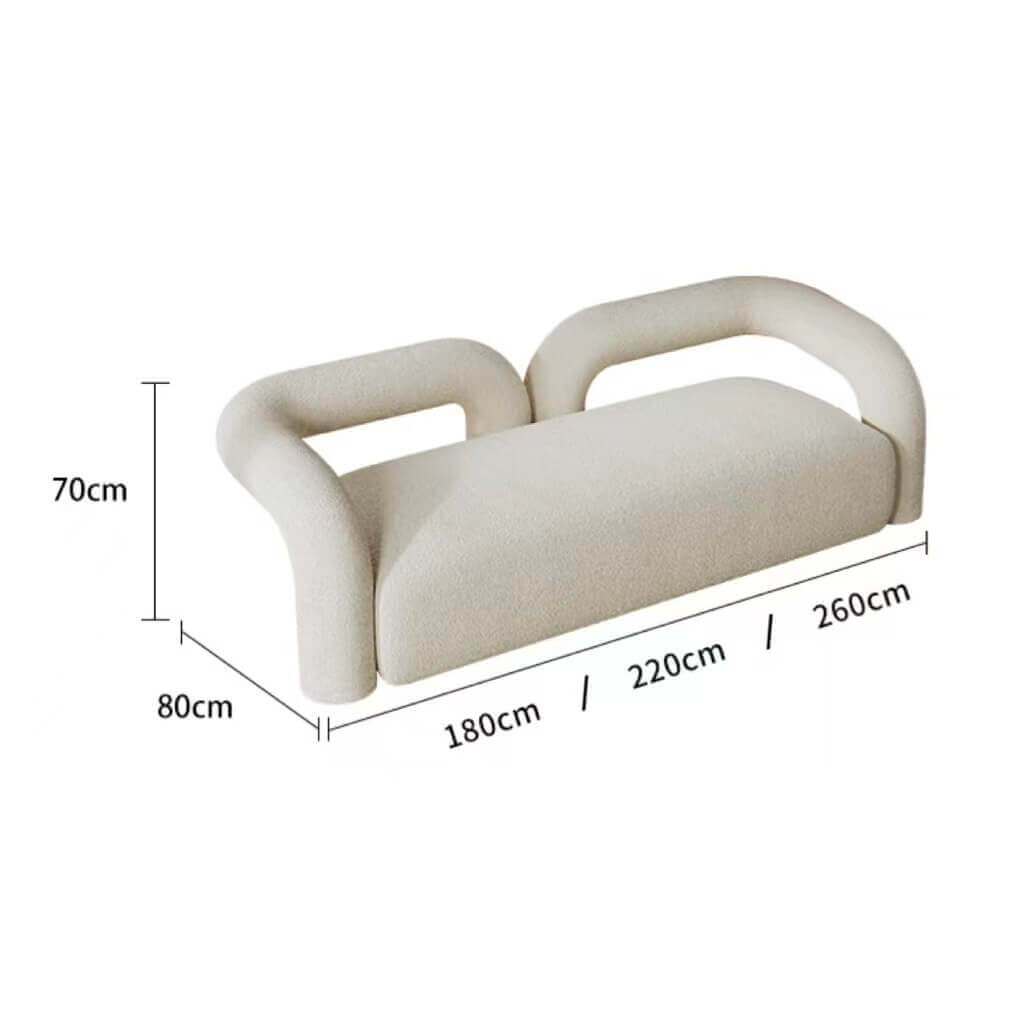 Modern curved sofa upholstered in boucle sherpa fabric with white, gray, yellow, pink, and Tiffany blue colors