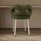 Boucle vanity stool with butterfly-shaped backrest in pink, green, and white colors