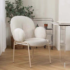 Ivory white boucle accent chair featuring stylish white metal legs for modern living spaces