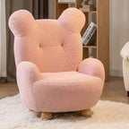 Boucle accent chair in yellow, pink, and white with a unique bear-shaped backrest