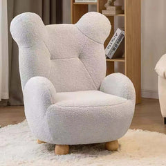 Modern boucle accent chair in yellow, pink, and white with bear-shaped backrest