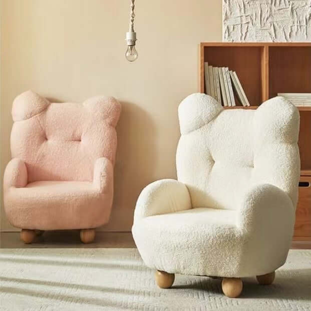 Boucle accent chair in yellow, pink, and white with a unique bear-shaped backrest