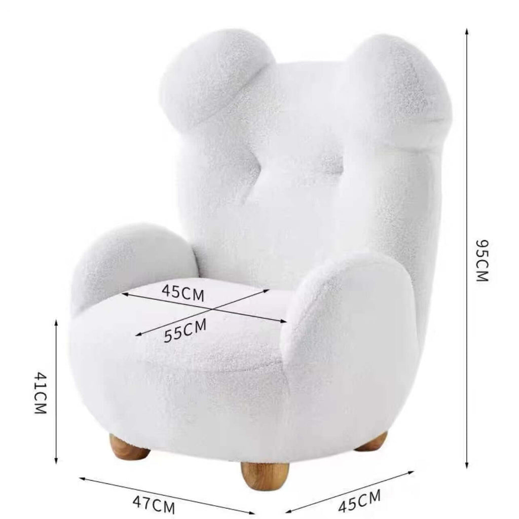 Boucle accent chair in yellow, pink, and white with a unique bear-shaped backrest