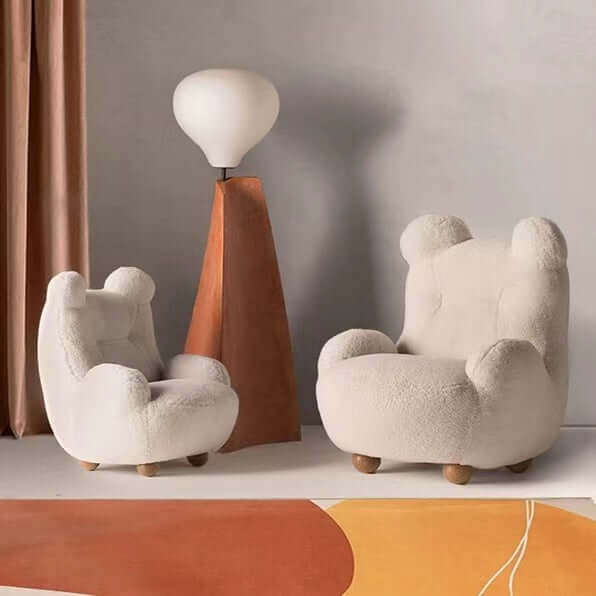 Boucle accent chair in yellow, pink, and white with a unique bear-shaped backrest