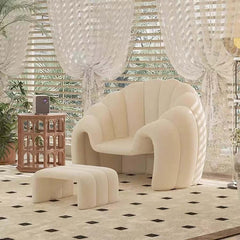 Elegant velvet chair and ottoman set in white, brown, and blue with modern design