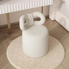 Butterfly-shaped vanity stool in cream boucle fabric for modern elegance