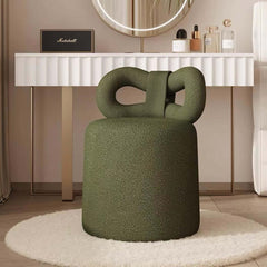 Cream boucle vanity stool featuring butterfly design for luxurious comfort