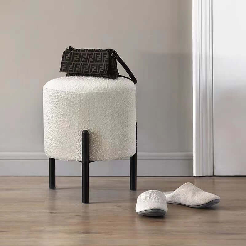 Round Nordic white boucle sherpa vanity stool with black legs, perfect as an accent chair