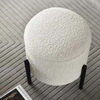Round Nordic white boucle sherpa vanity stool with black legs, perfect as an accent chair