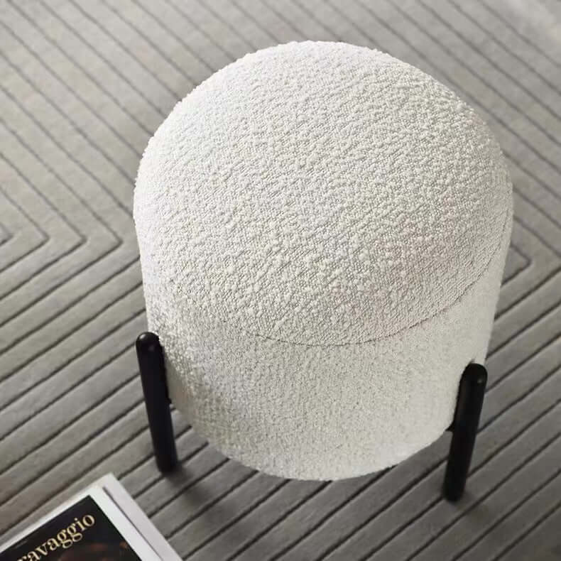 Round Nordic white boucle sherpa vanity stool with black legs, perfect as an accent chair