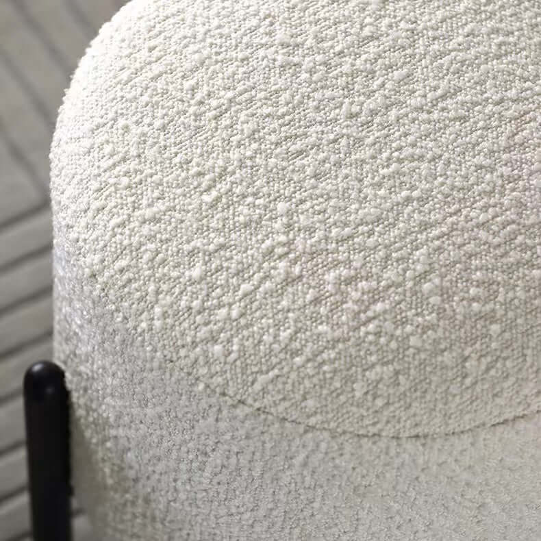 Round Nordic white boucle sherpa vanity stool with black legs, perfect as an accent chair