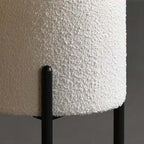 Round Nordic white boucle sherpa vanity stool with black legs, perfect as an accent chair