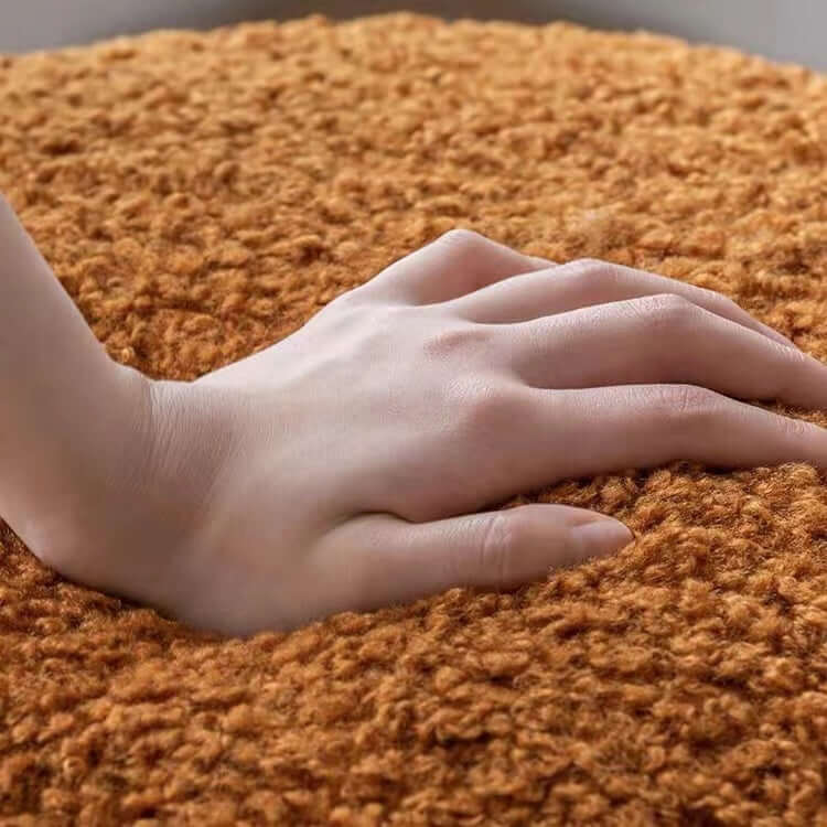 Brown and white boucle stool with short and long design, ideal for living room, bedroom, or entryway seating