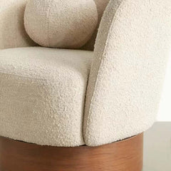 Elegant ivory boucle swivel chair with wooden base for comfortable seating