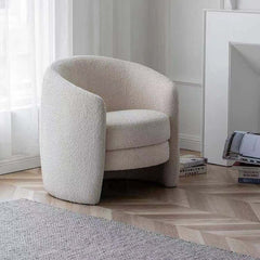 Ivory boucle accent chair with Sherpa seat and low back design