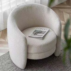 White and gray cozy chair with green Nordic-inspired design and low back