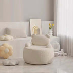 Off-white boucle sherpa bear accent chair with black and brown details, cozy lounge sofa seating