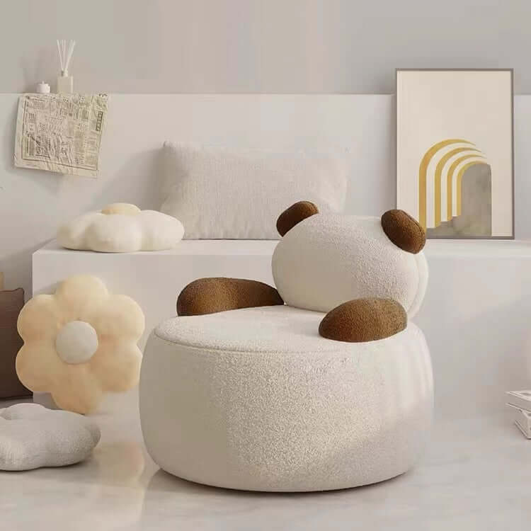 Off-white boucle sherpa bear accent chair with black and brown details, cozy lounge sofa seating