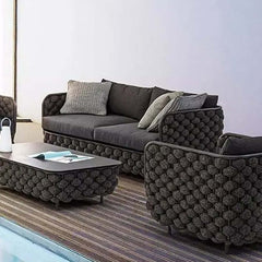 Black patio sofa with wide seating for outdoor comfort