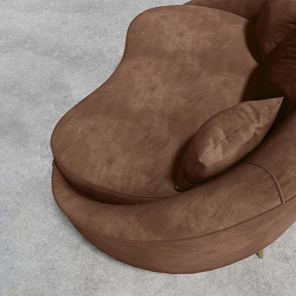 Pink velvet curved sofa with gold metal base, modern design, 63 inch length, includes toss pillow