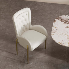 Oakic White PU Leather Upholstered Dining Chair Modern Tufted Wingback Chair with Arm - Close-up of tufted armchair detail