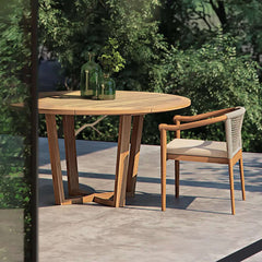 7-piece teak dining set with round table and 6 natural chairs