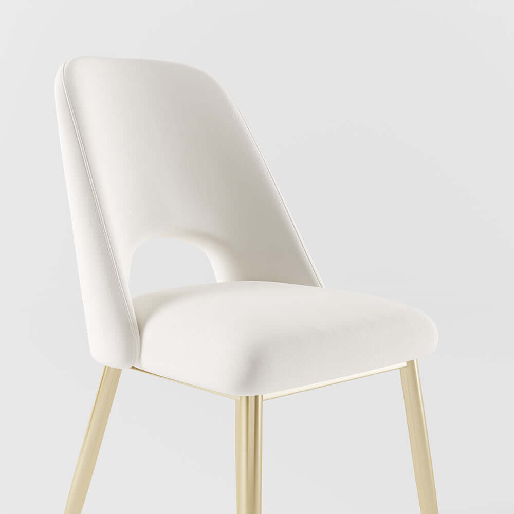 Sleek modern upholstered dining chairs in black with hollow back and shiny gold legs
