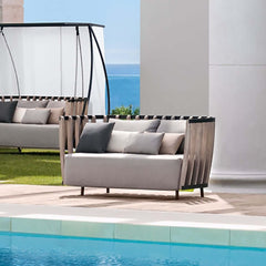 2-seater outdoor sofa with natural ash wood frame and cushion back