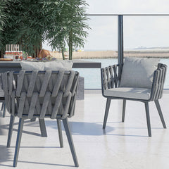 Outdoor dining set with extendable ceramic table and woven aluminum armchairs, 7 pieces