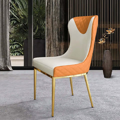 Pair of contemporary orange side chairs with wingback, upholstered in PU leather