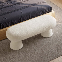 Elegant white and orange boucle bedroom bench with 2 legs and comfy upholstered top