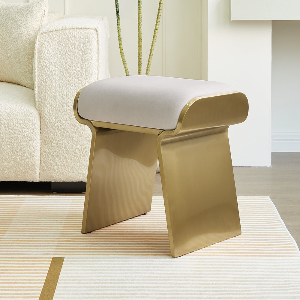 Contemporary beige backless vanity stool featuring leathaire upholstery and stainless steel frame
