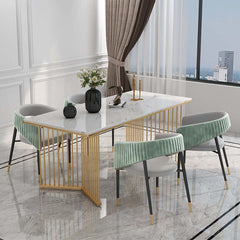 Contemporary green velvet dining chair with metal legs, stylish and comfortable seating