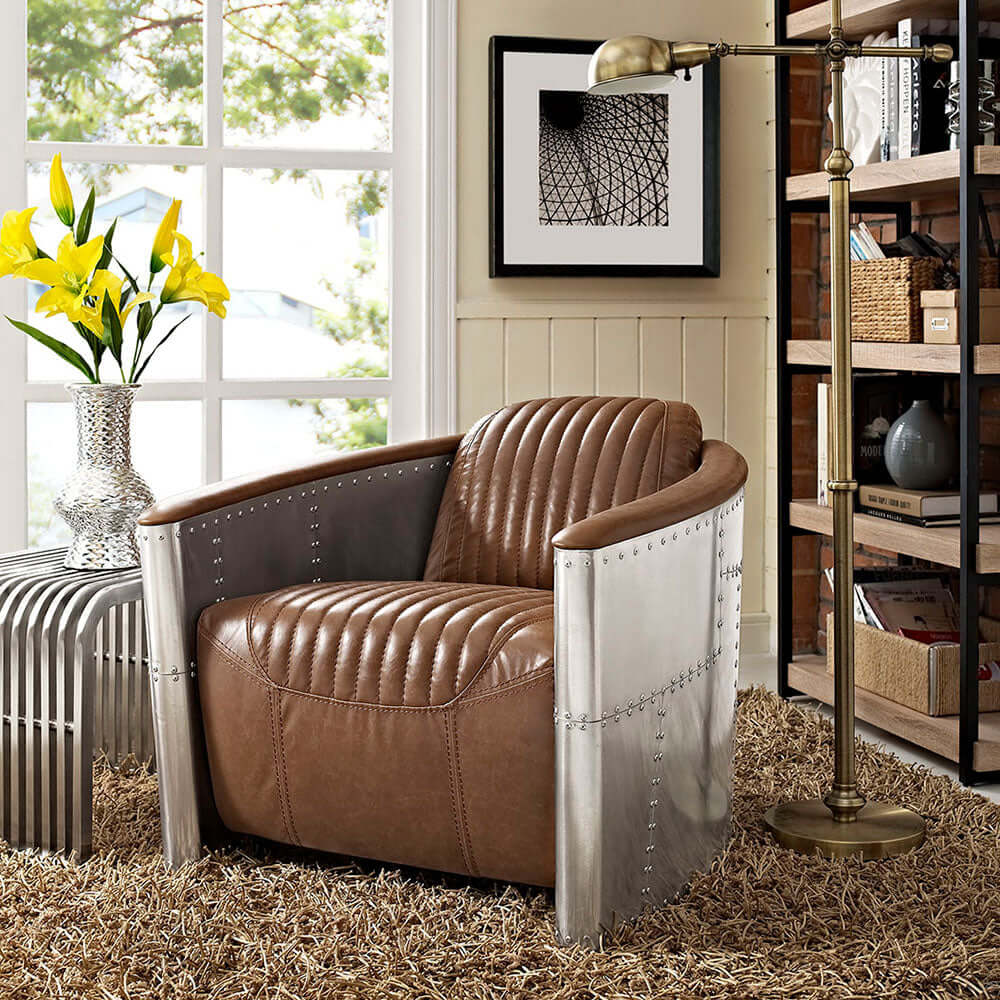 Black industrial loft barrel accent chair with PU leather upholstery and nail-head trim