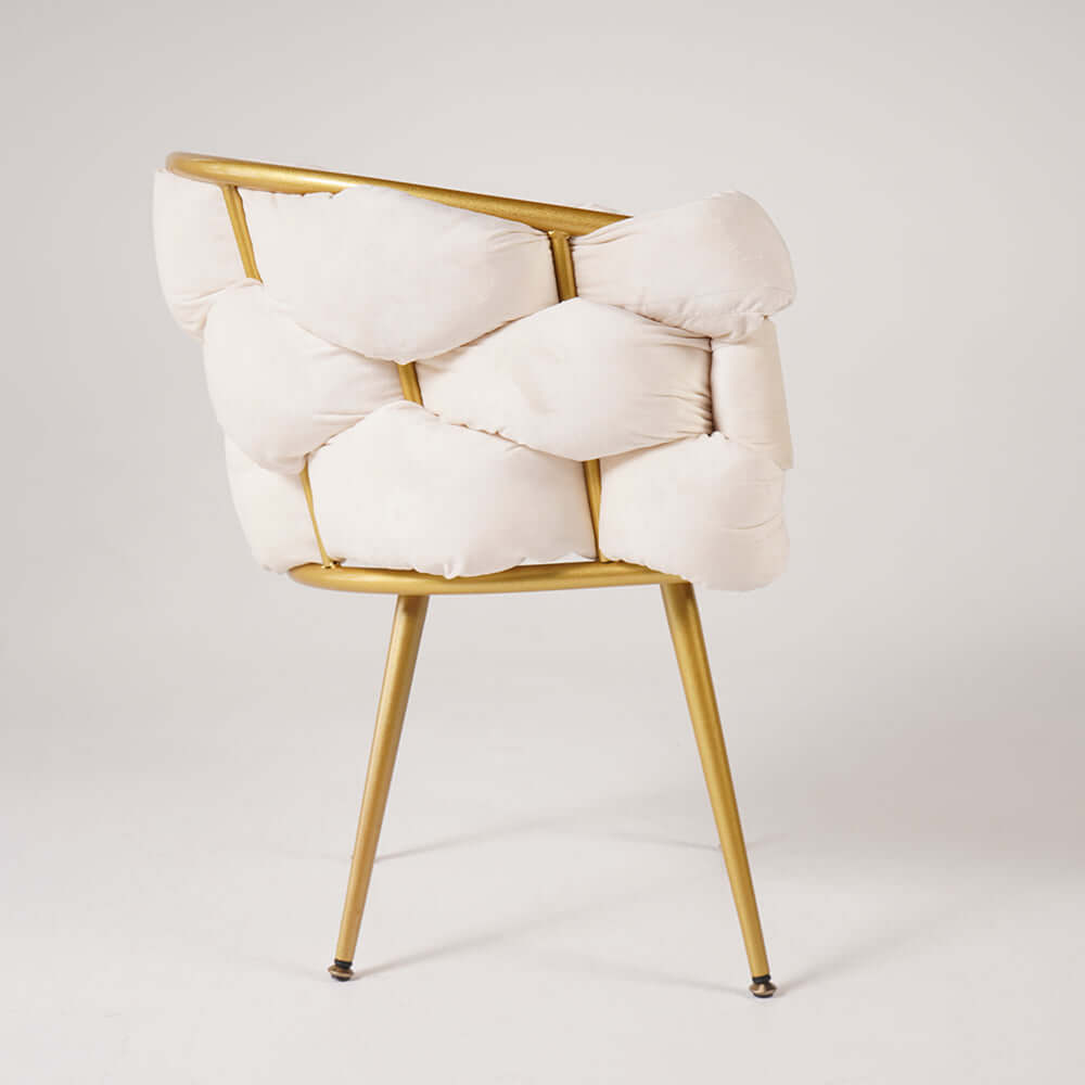 Chic beige upholstered armchair with modern gold legs for stylish living spaces