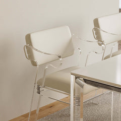 Modern white dining chair with arms and PU leather upholstery for a sleek and elegant dining setup