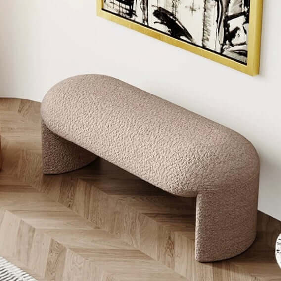 Brown and white boucle stool with short and long design, ideal for living room, bedroom, or entryway seating