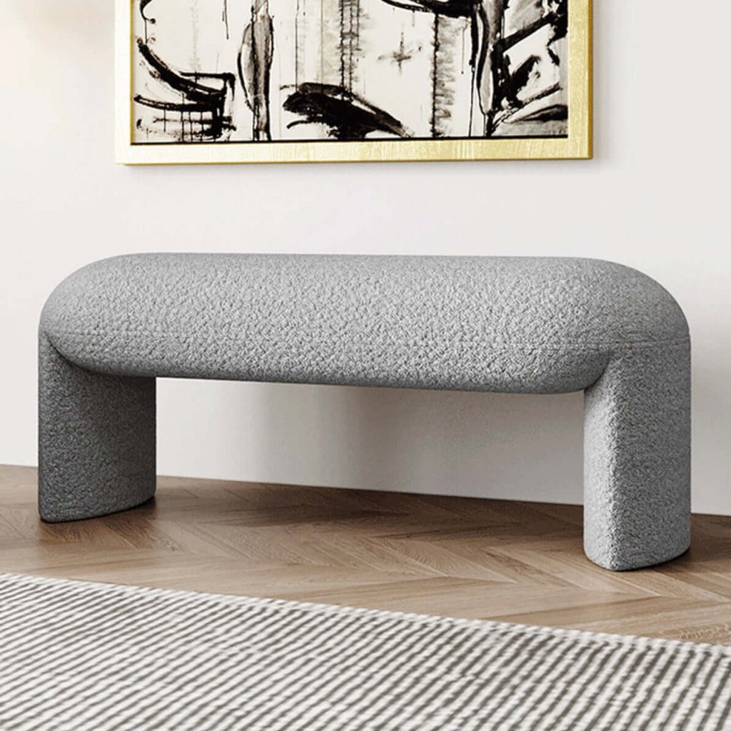 Brown and white boucle stool with short and long design, ideal for living room, bedroom, or entryway seating