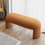 Brown and white boucle stool with short and long design, ideal for living room, bedroom, or entryway seating