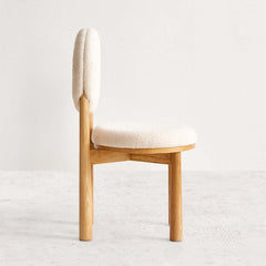 Stylish white boucle sherpa seat with wooden legs