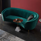 Stylish deep green upholstered sofa with sturdy metal legs for modern interior design