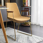 Black PU leather contemporary dining chair with gold metal legs in modern design