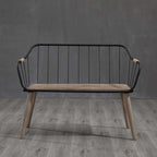 Charming wooden bench with backrest and armrests, ideal for backyard picnics