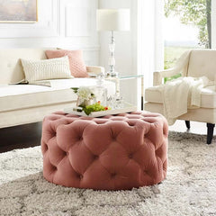 Stylish tufted ottoman with light gray velvet upholstery