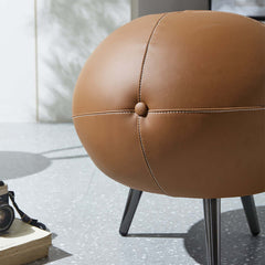 Elegant round pouf ottoman in brown faux leather, suitable for modern and traditional interior designs