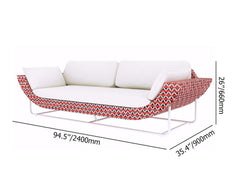 Large modern patio sofa with white and orange cushions and aluminum rattan material