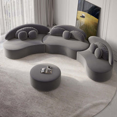 Modern round sectional 7-seat sofa set in beige velvet upholstery with ottoman and decorative pillows