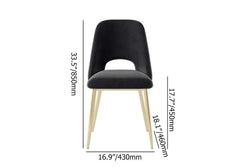 Sleek modern upholstered dining chairs in black with hollow back and shiny gold legs